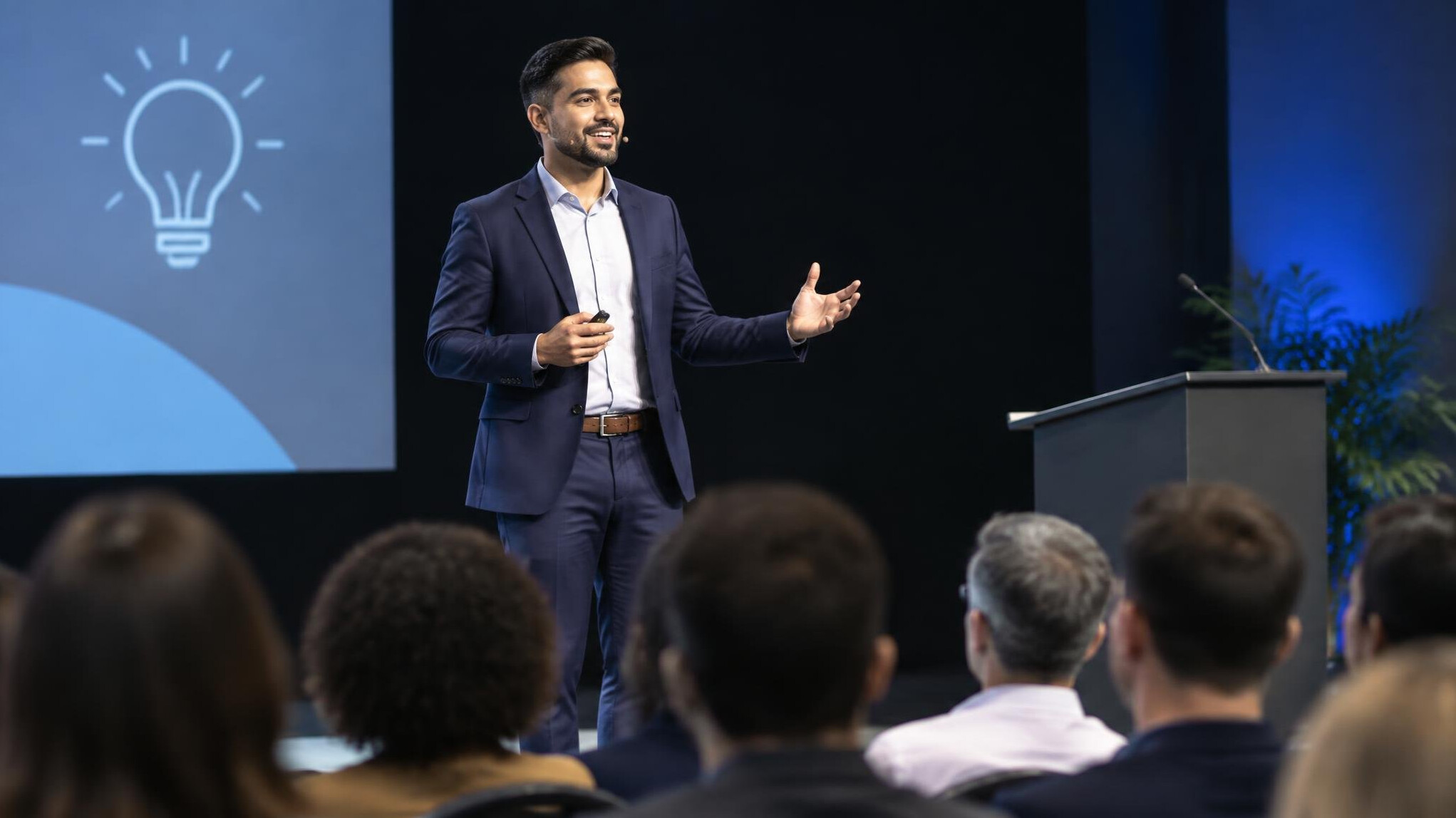 confident speaker on stage