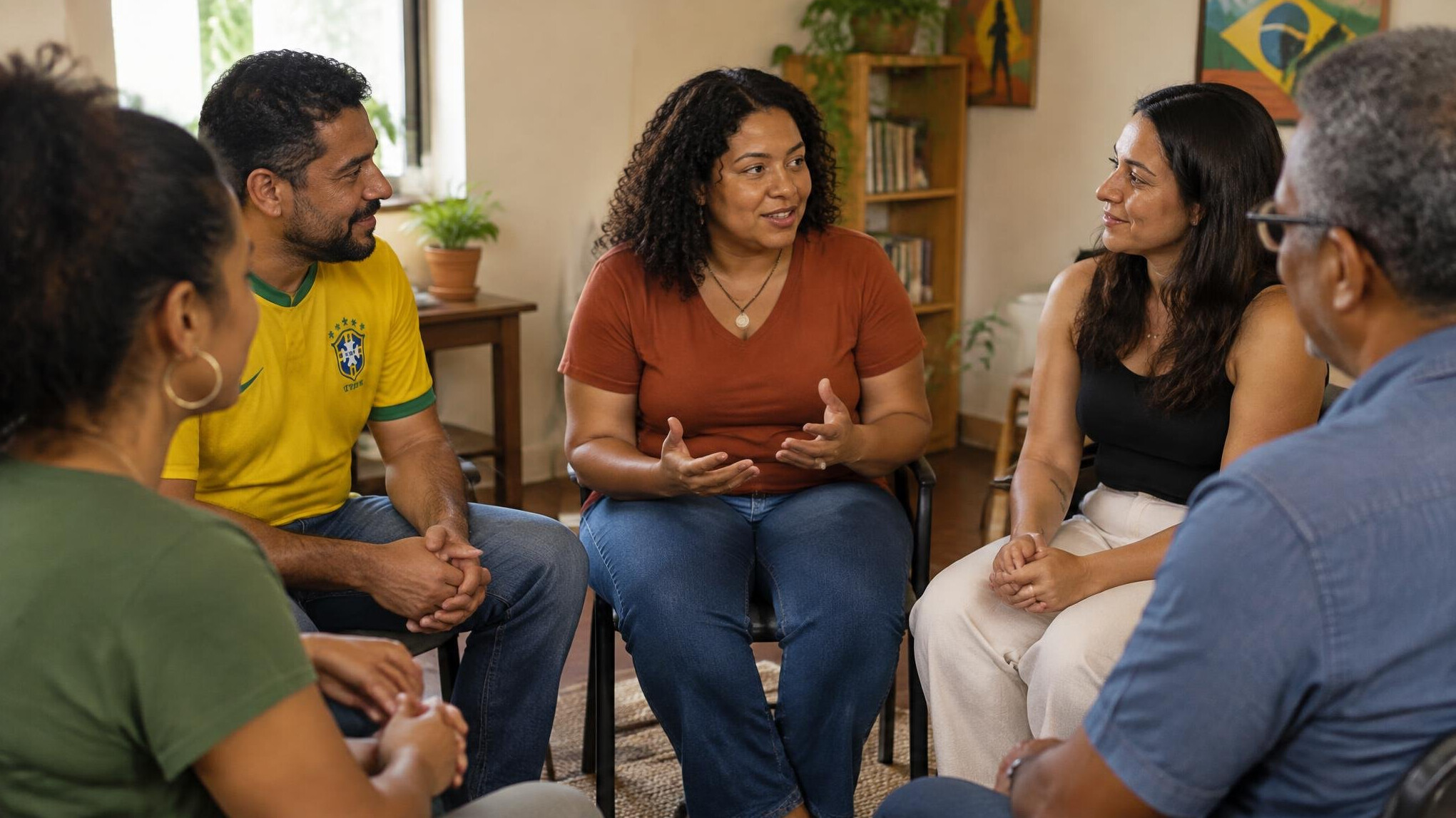 Group of people sitting in a circle having a supportive discussion